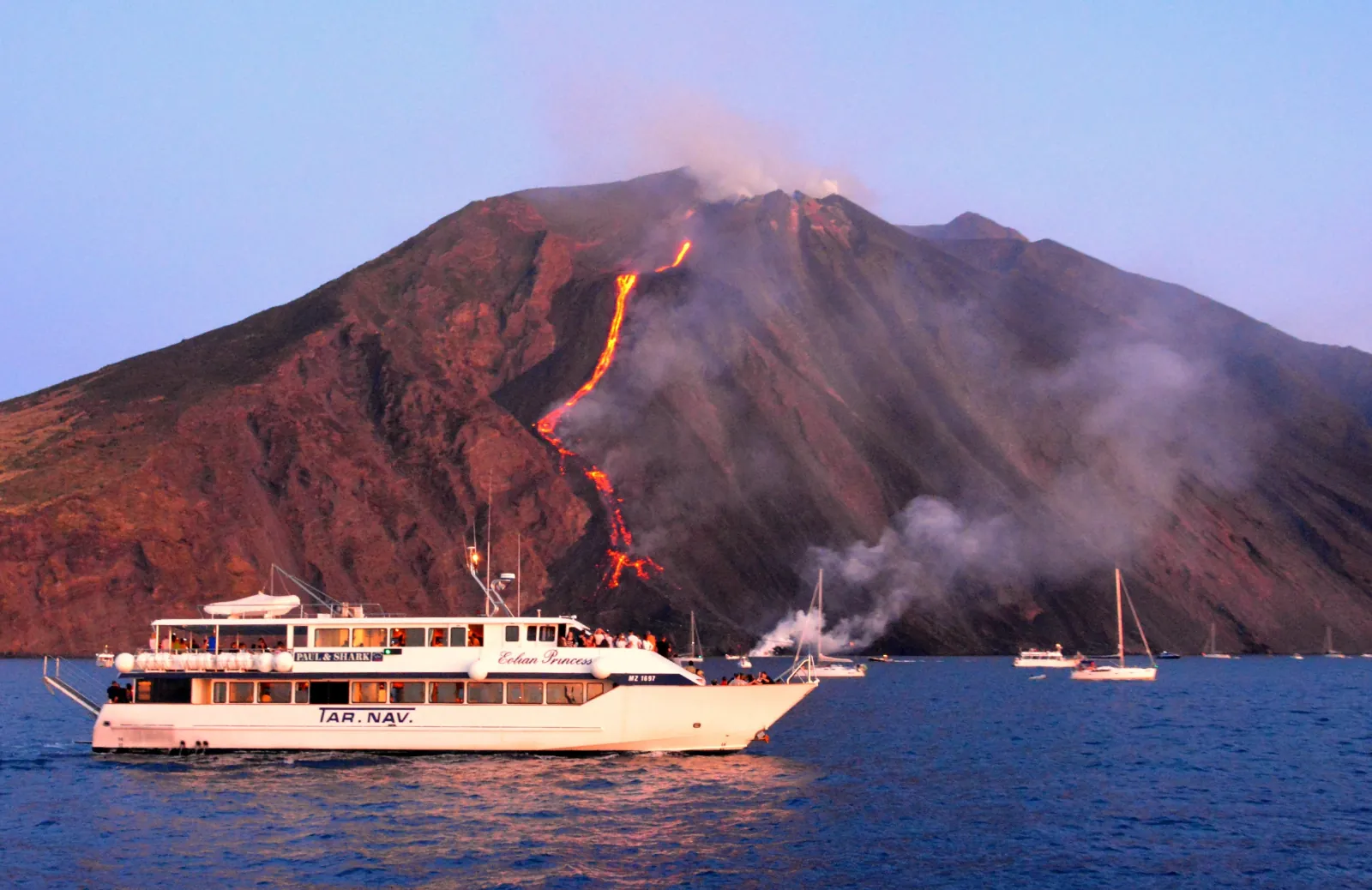 SAT motorboat below Stromboli as lava runs down the Sciara del Fuoco