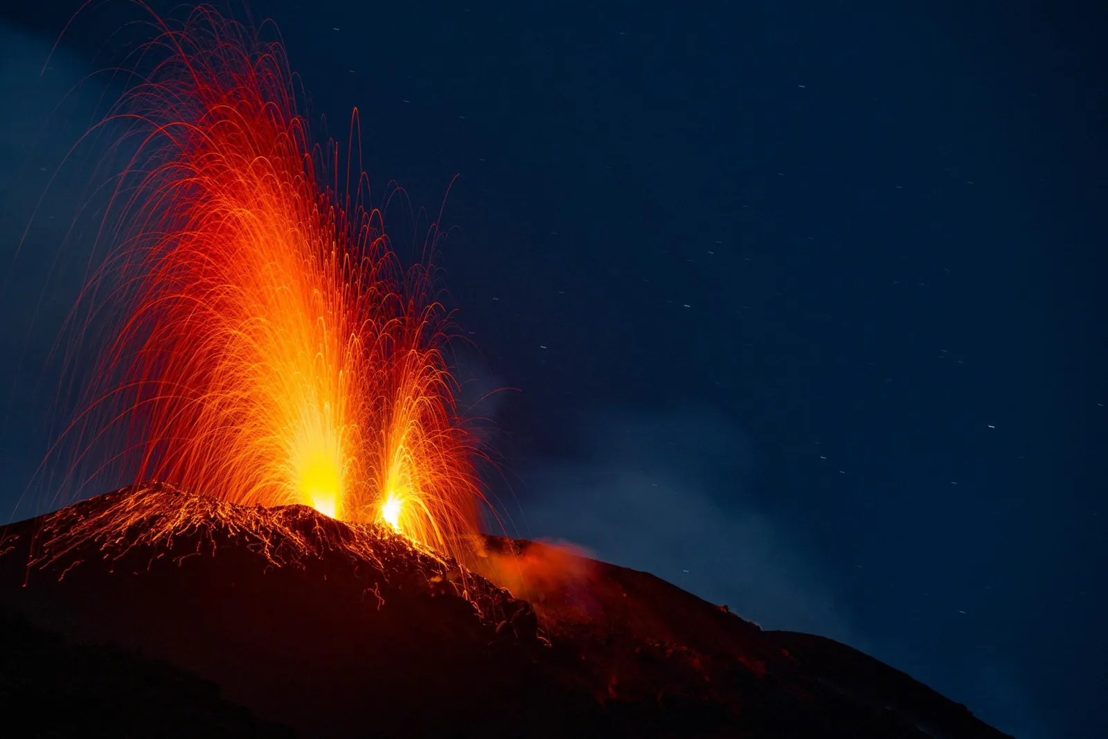 Lava fountain from Stromboli's craters at night