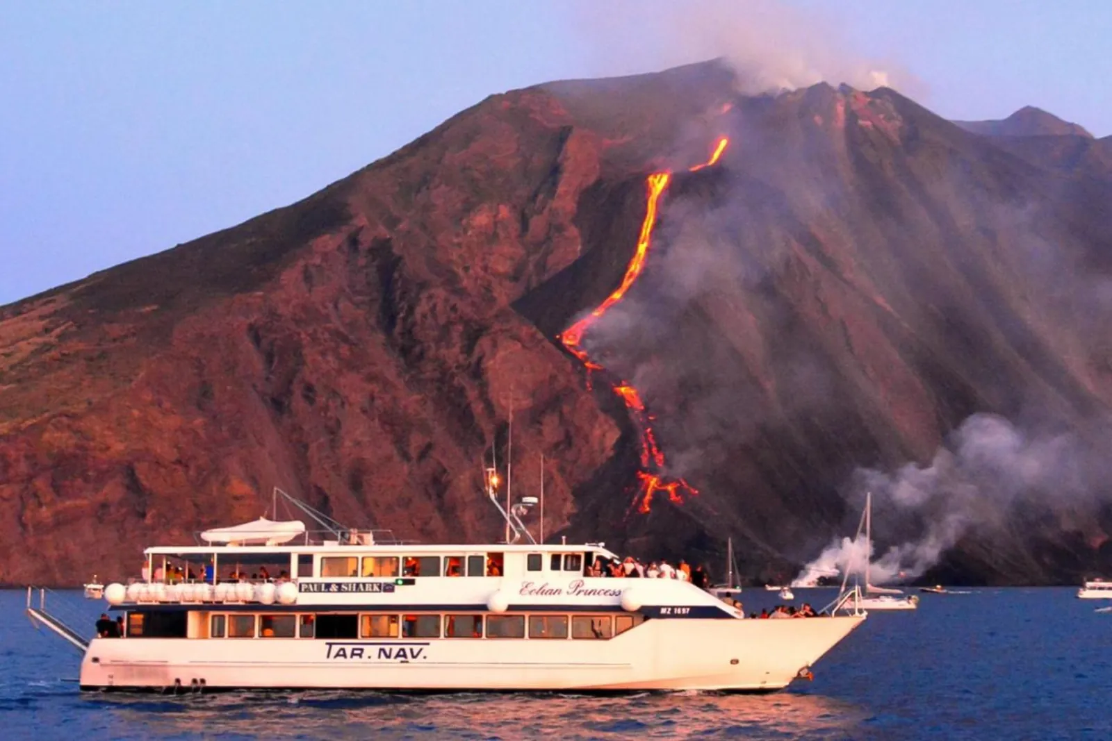 Tarnav motorship below Stromboli as lava runs down the Sciara del Fuoco