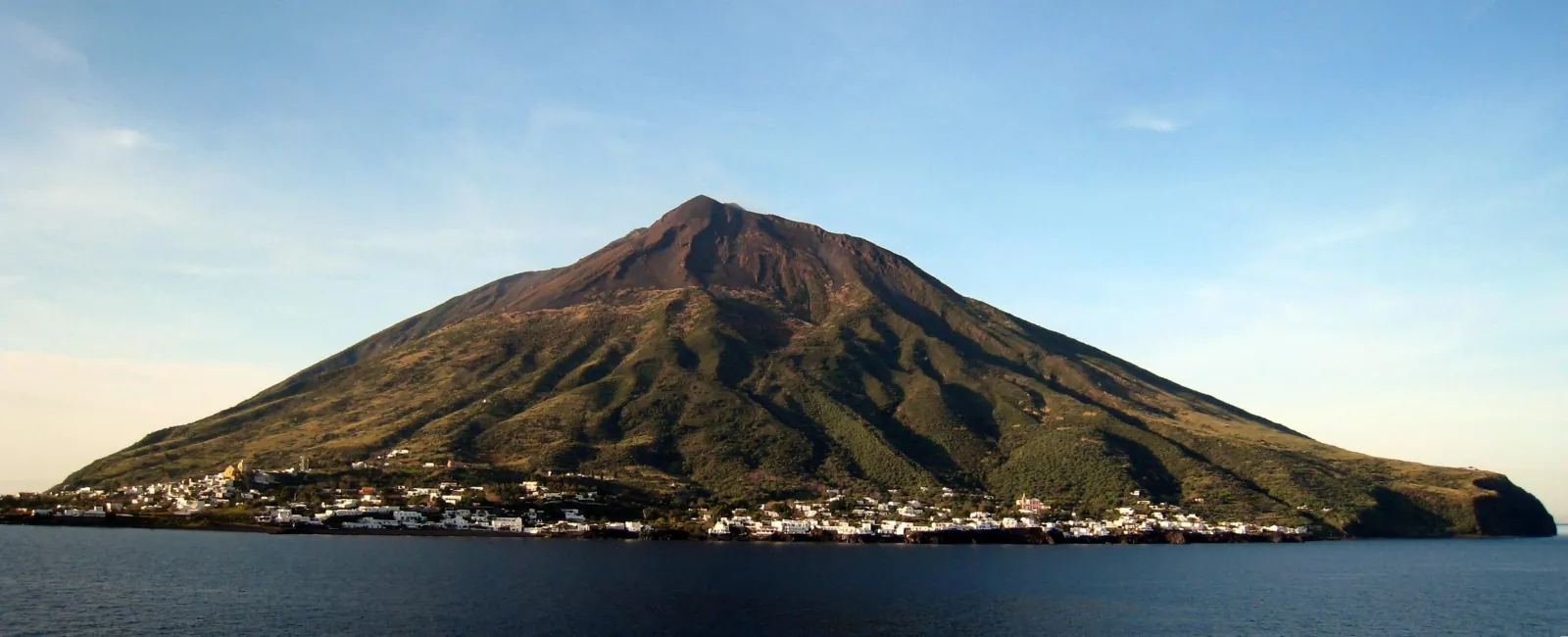 Stromboli island seen from the sea in late light