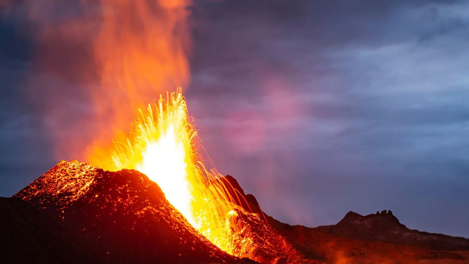 Stromboli erupting under a stormy sky