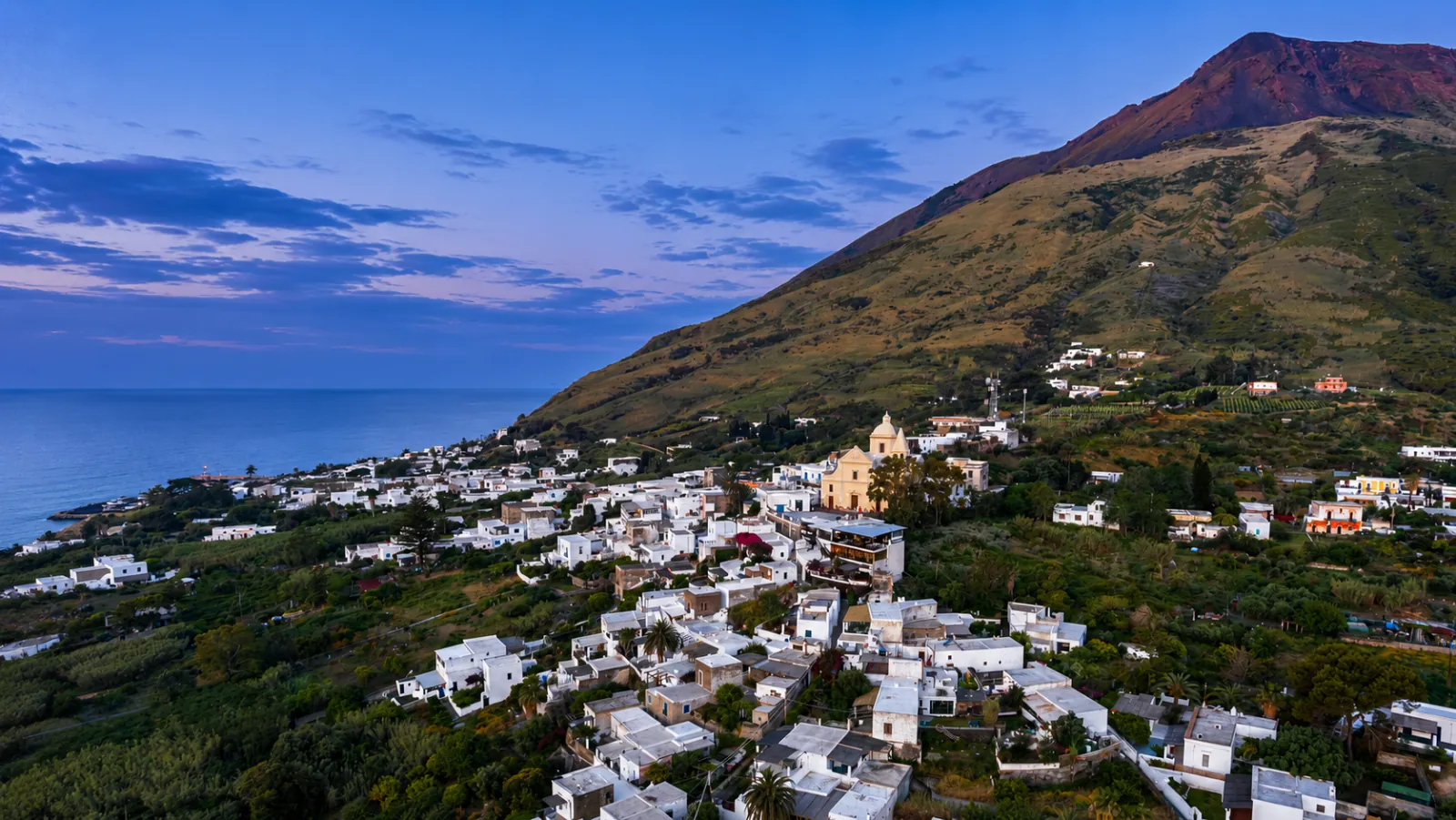 Stromboli's village spread over the lower slopes