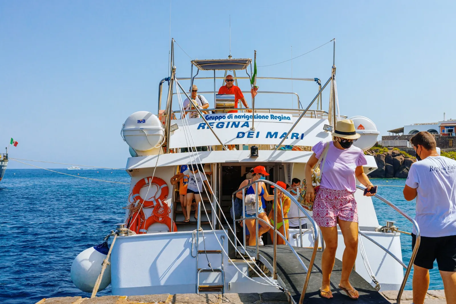 Passengers boarding the Regina dei Mari excursion boat