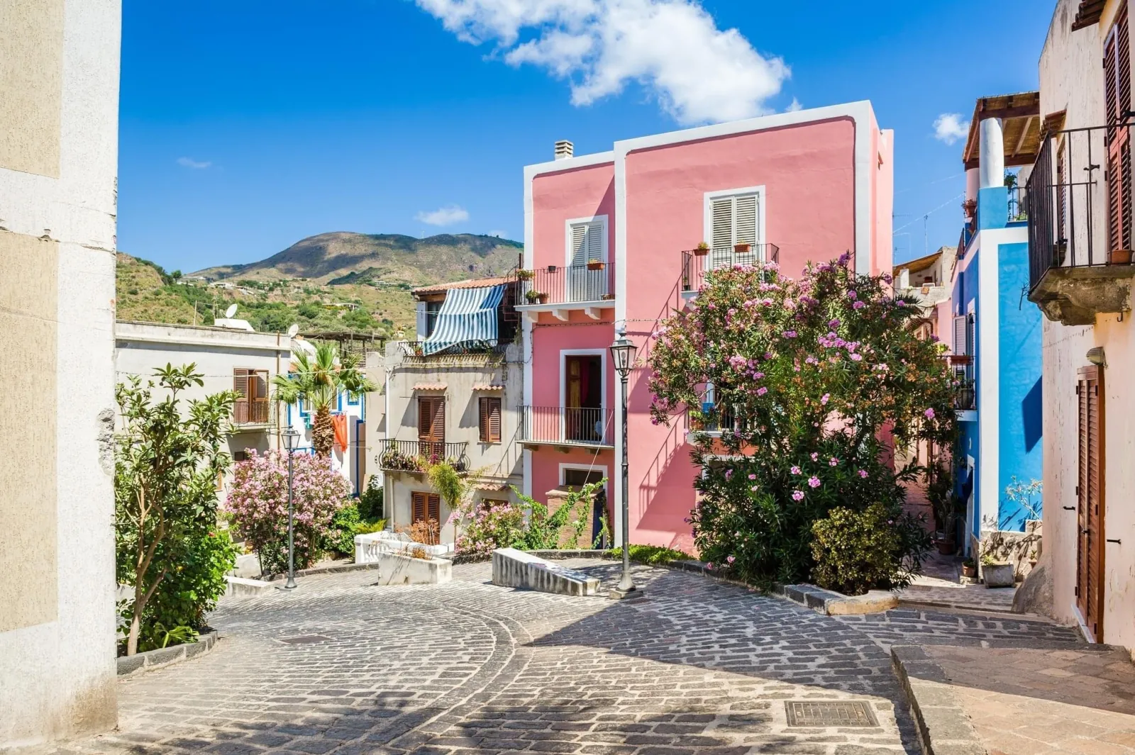 Pastel houses on a lane in Lipari