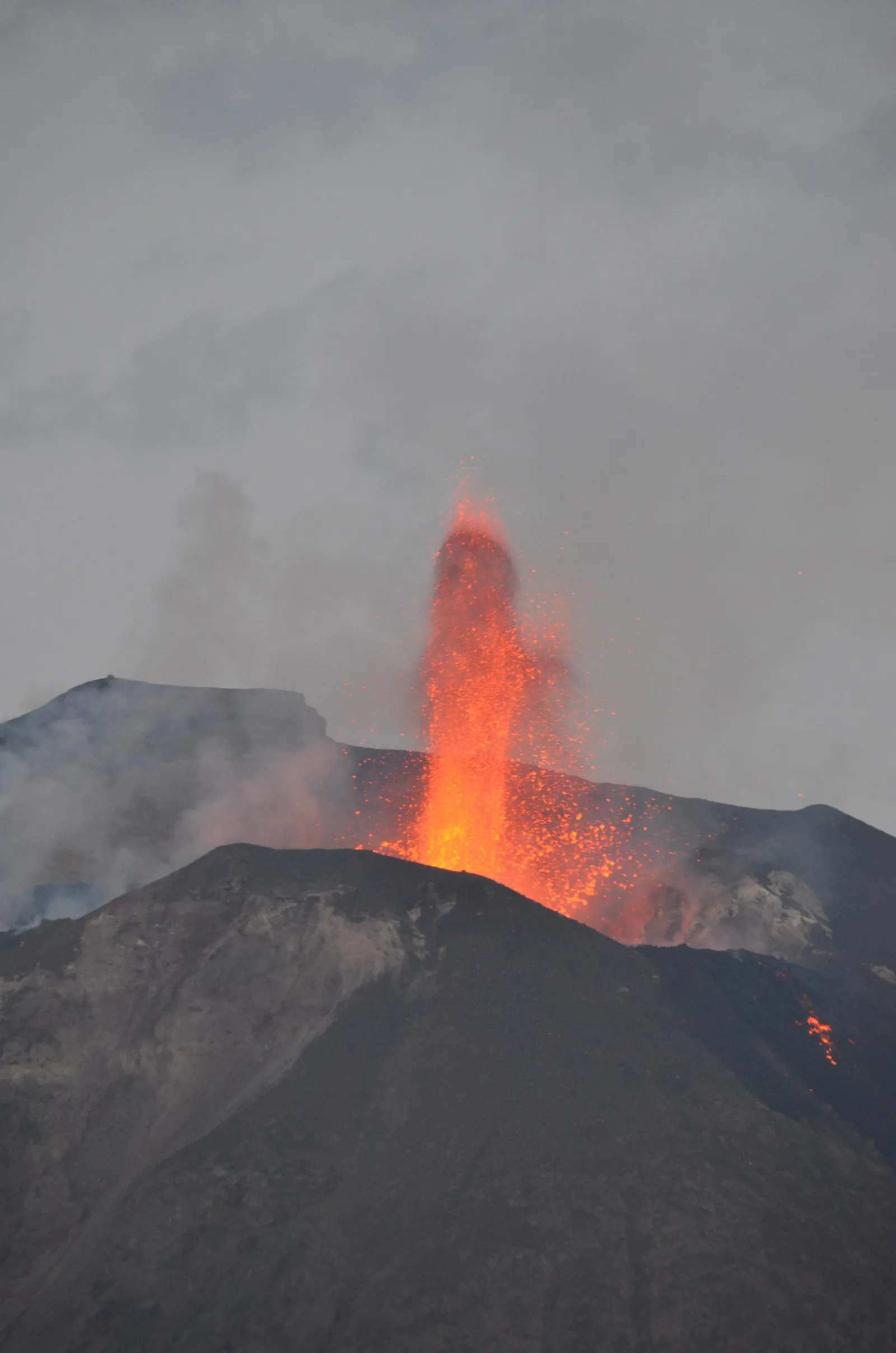 A lava fountain from Stromboli's summit at night