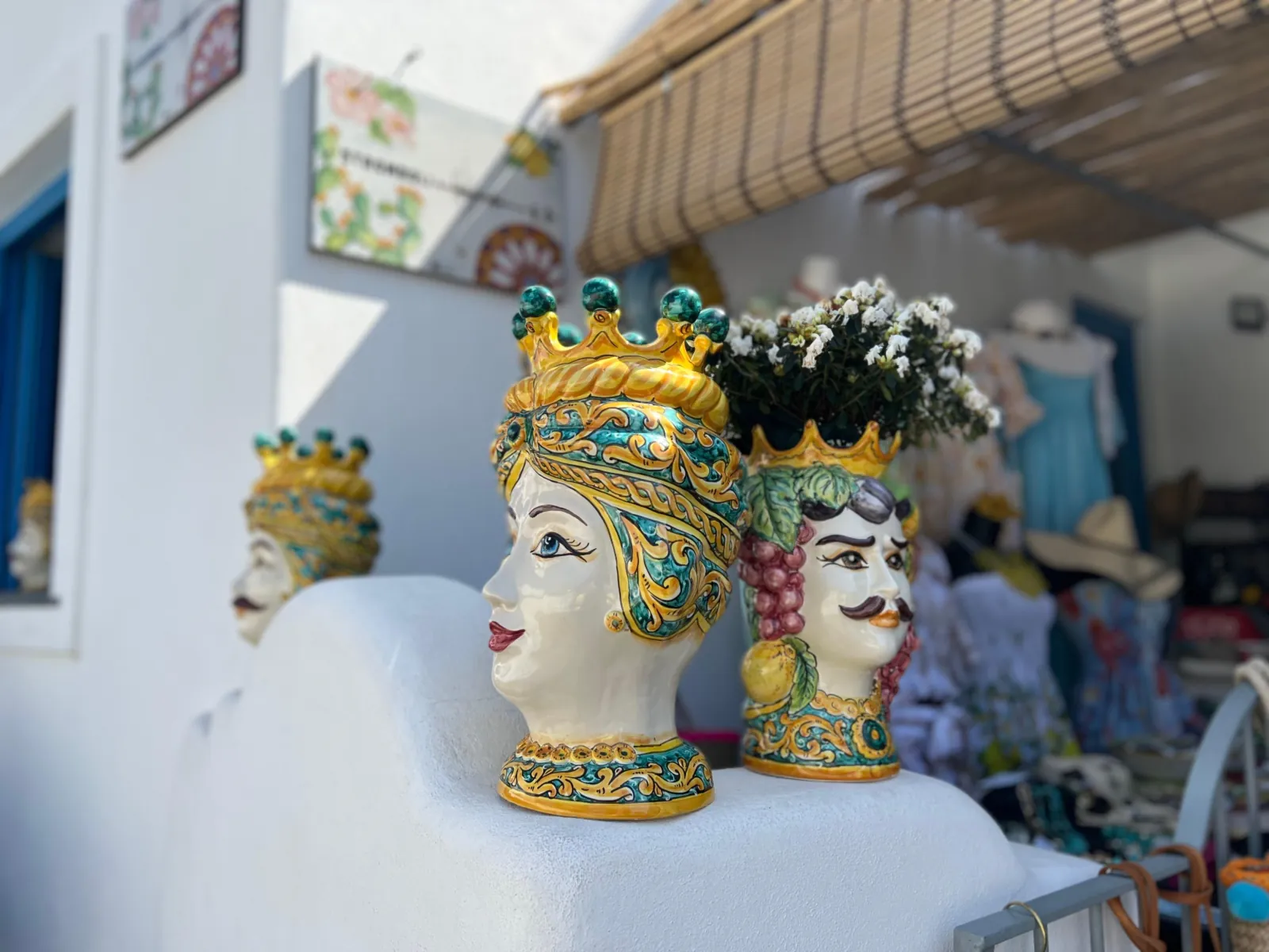 Painted ceramic heads outside a shop on Stromboli