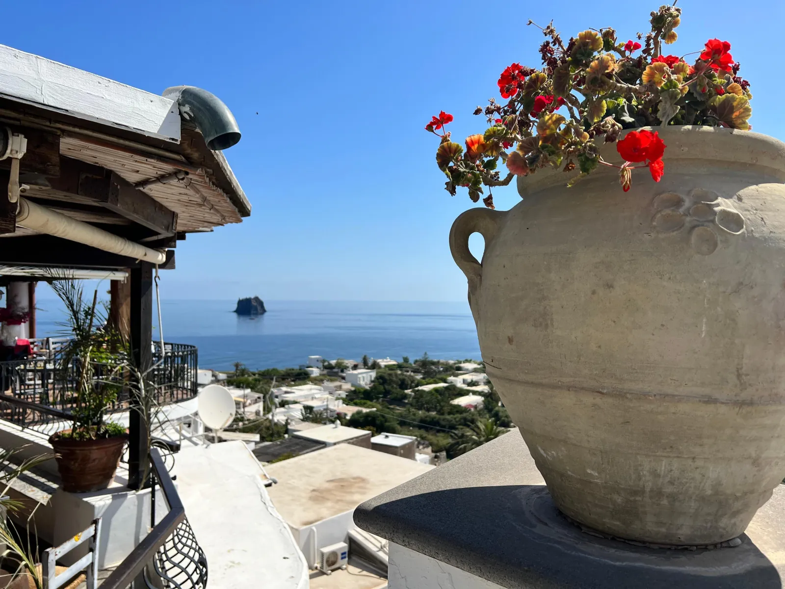 Terracotta pot on a terrace above the sea