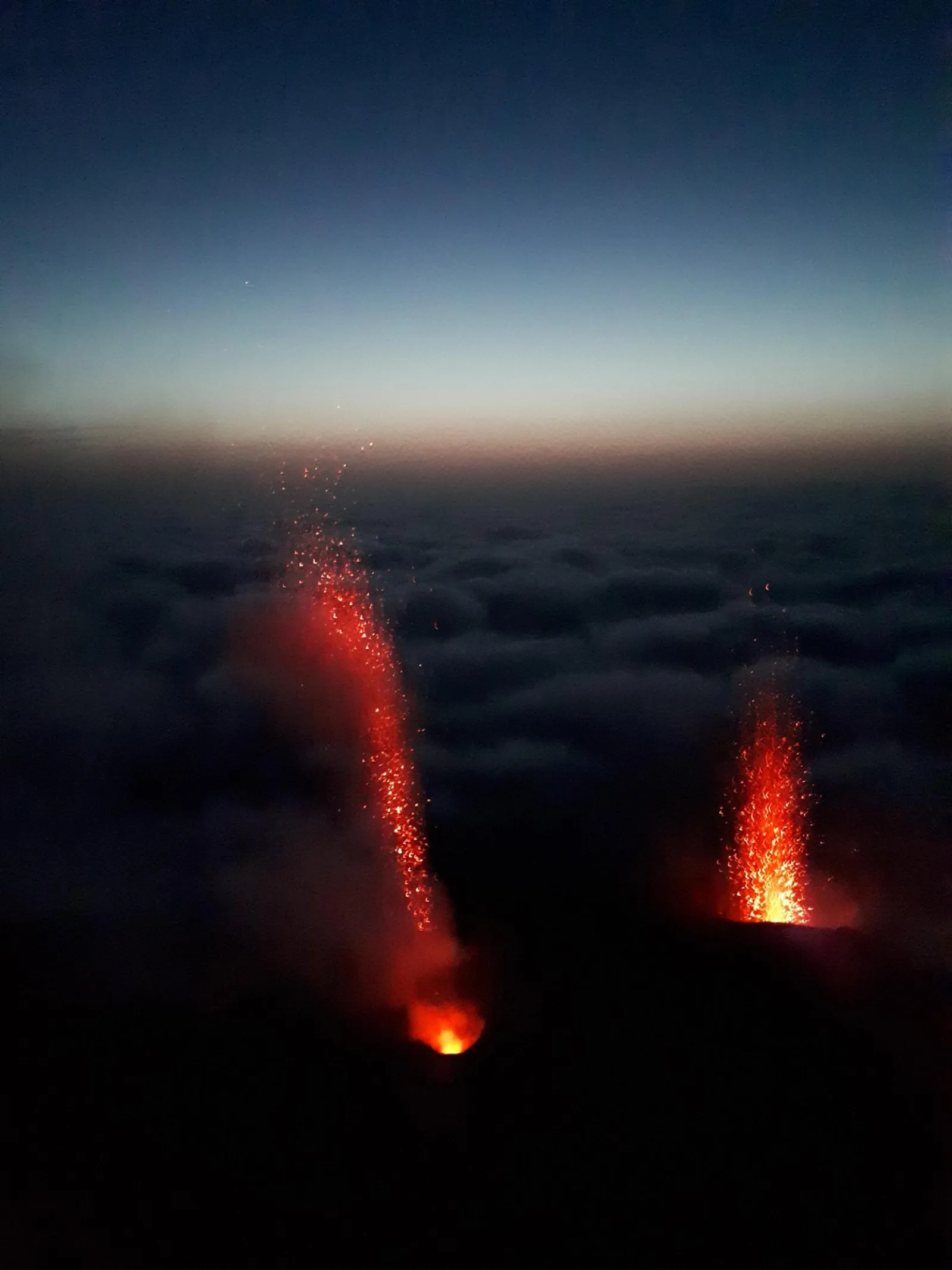 Lava glowing on the Sciara del Fuoco at night